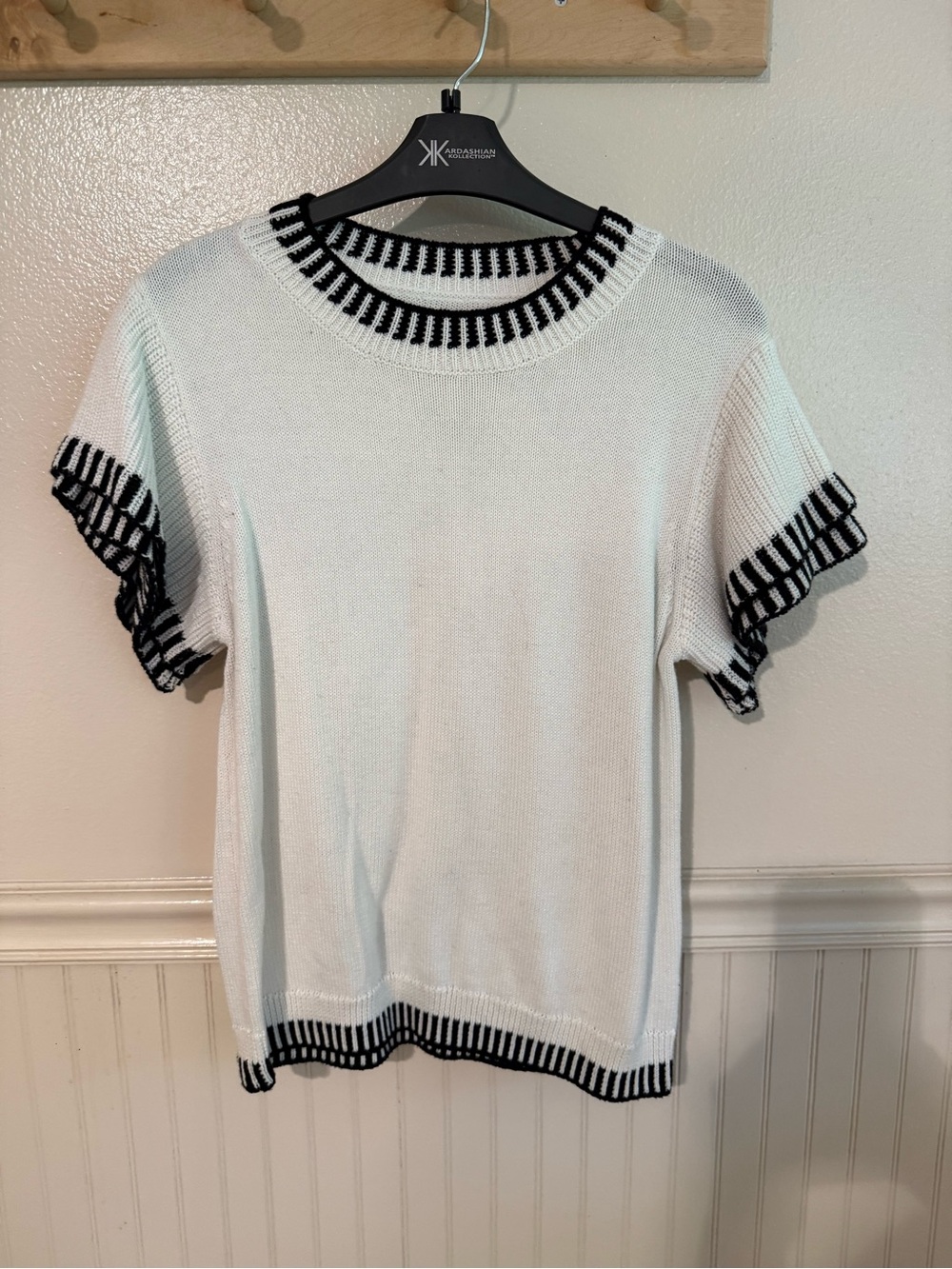White Short-Sleeve Knit Top with Black Trim